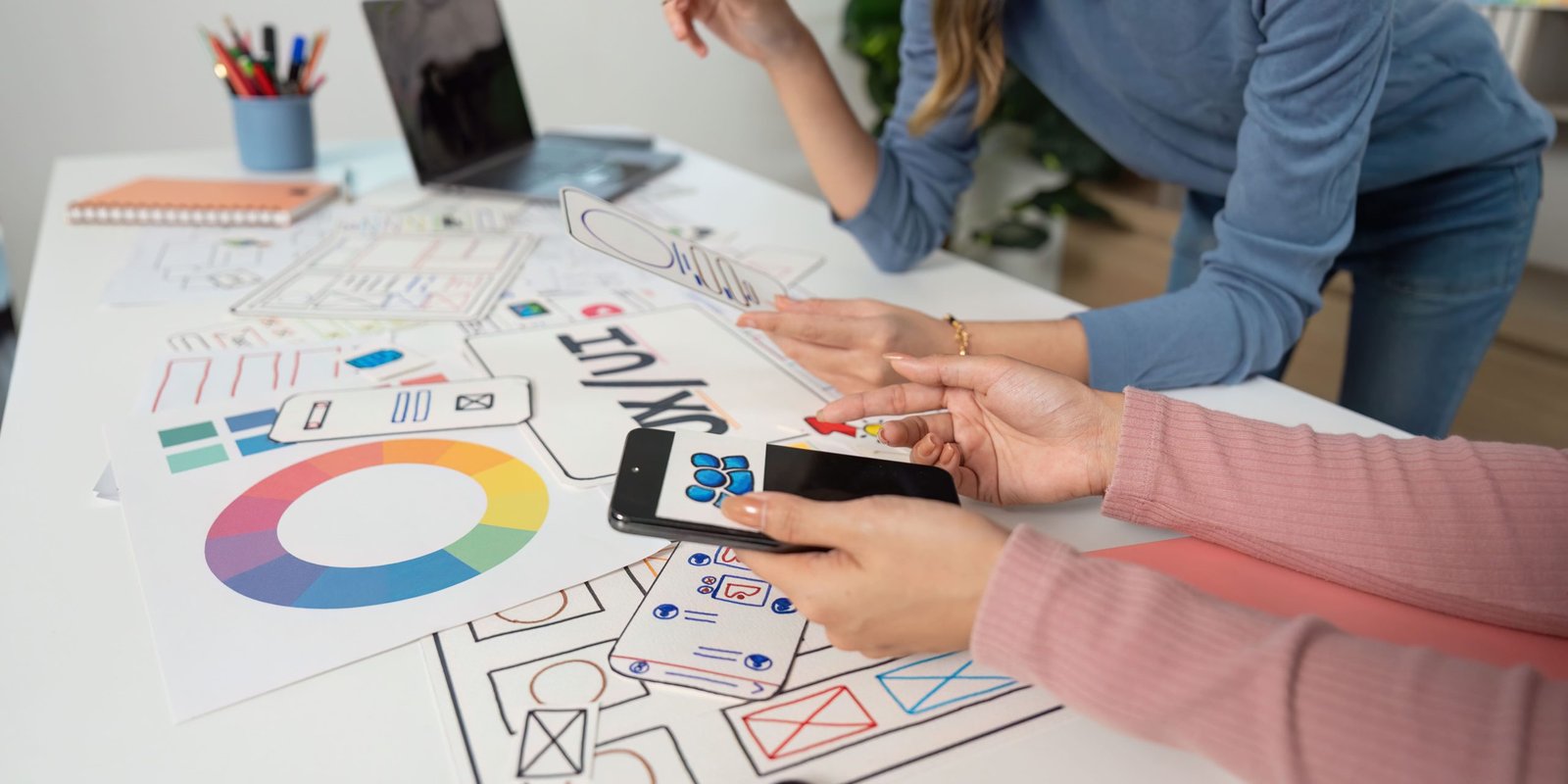 vecteezy-ux-and-ui-design-process-designers-analyzing-mobile-app-70344902